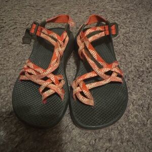 Orange and Black Chacos